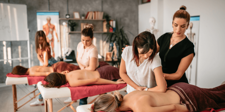 A group of women receiving therapeutic massages in a serene room, promoting relaxation and wellness.